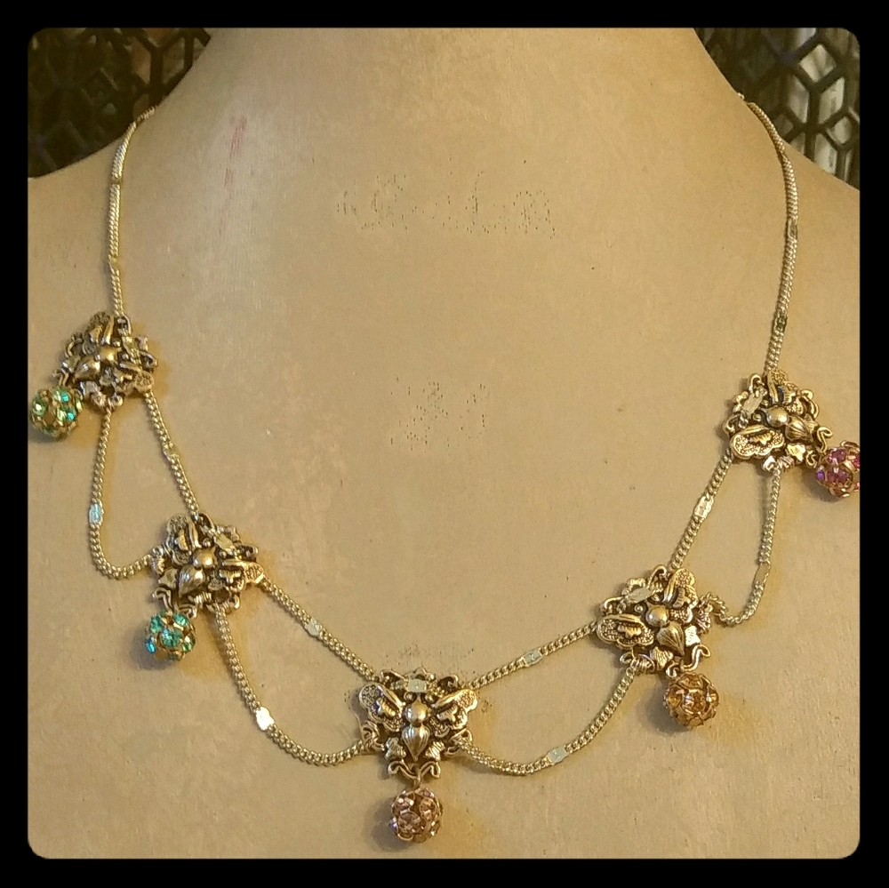 Gold tone festoon necklace